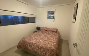 Second bedroom has double bed with inbuilt wardrobes and ocean views
