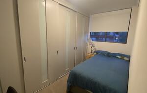 Third bedroom has a single bed , an office desk and huge wardrobes