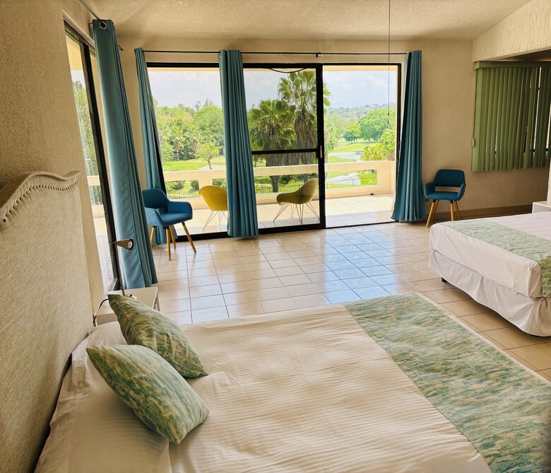 Master bedroom with balcony golf course views