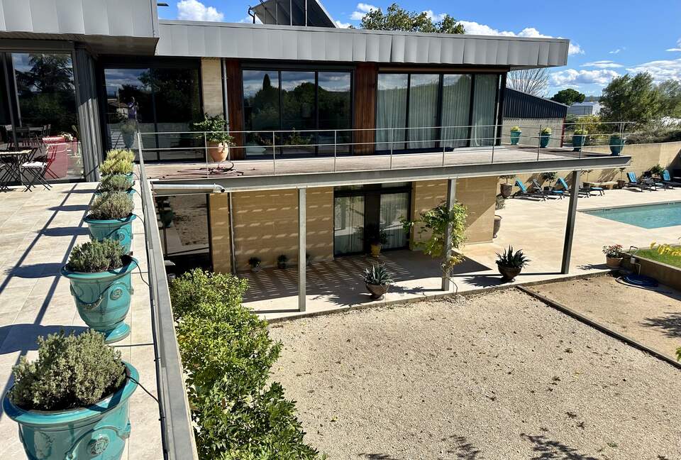 Main Upper: Terrace, view towards main living and Primary