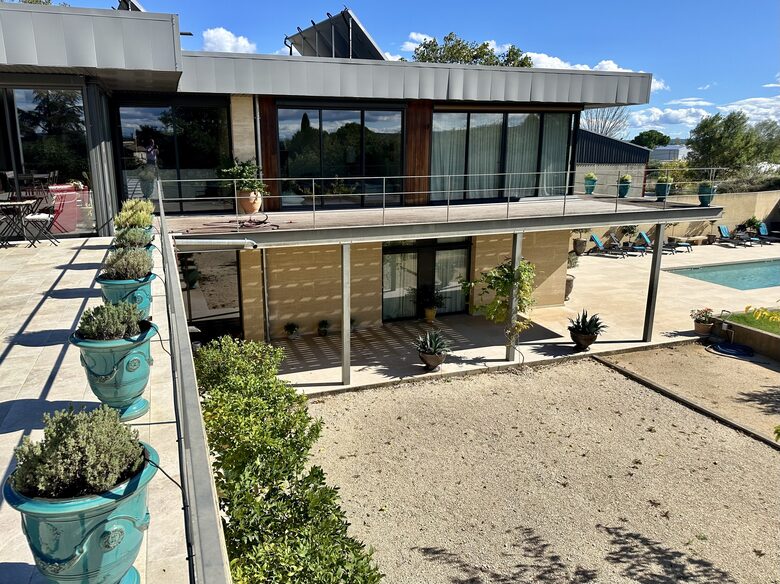 Main Upper: Terrace, view towards main living and Primary
