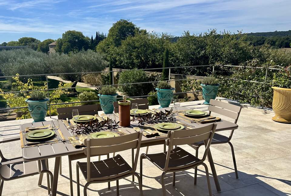 Main Upper: Terrace dining, view towards agricultural zone