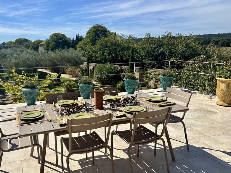 Main Upper: Terrace dining, view towards agricultural zone