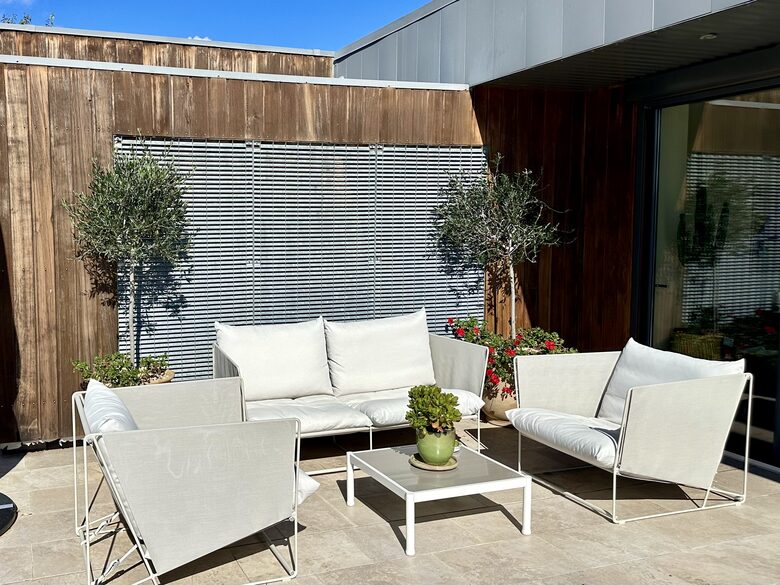 Main Upper: Terrace seating outside open living area