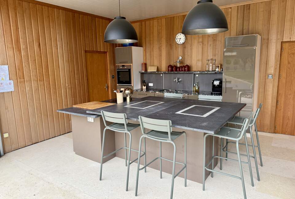 Guesthouse: Summer kitchen and bar seating; bedroom 3, left