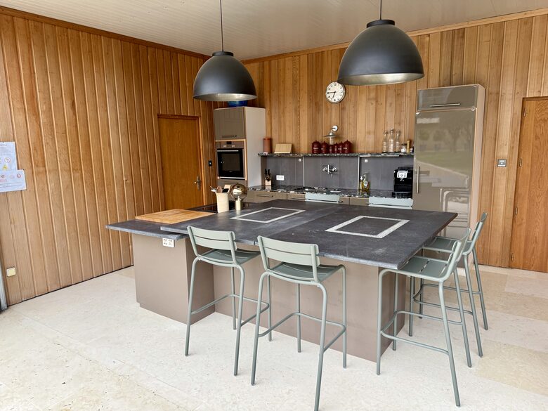 Guesthouse: Summer kitchen and bar seating; bedroom 3, left