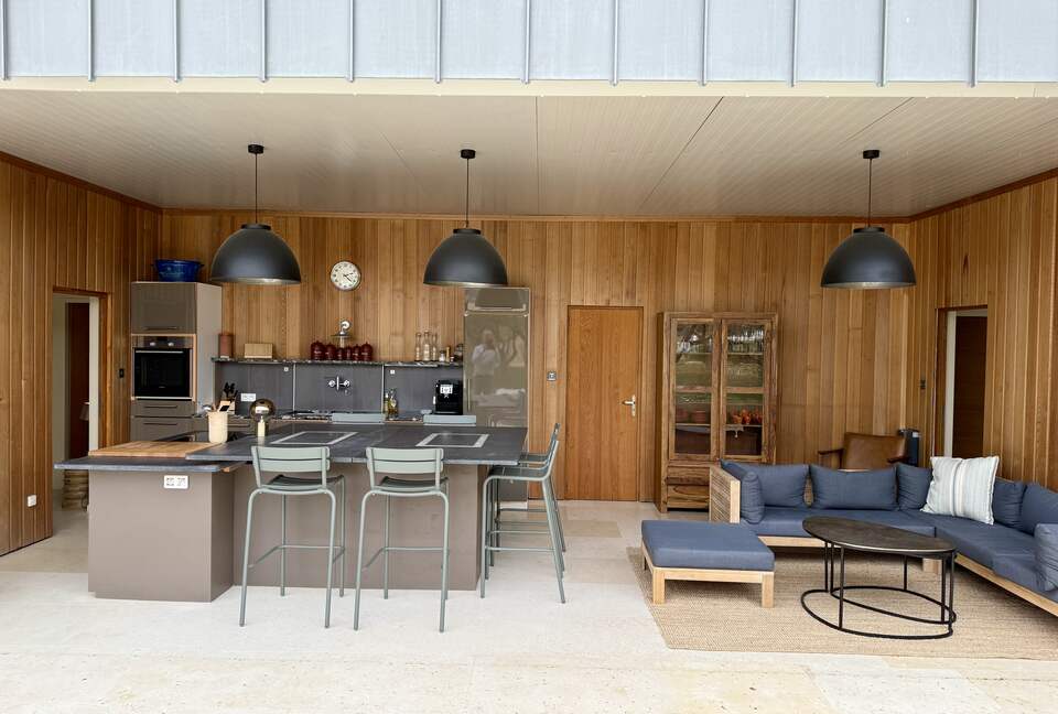 Guesthouse: Summer kitchen, living; bedrooms to right, left