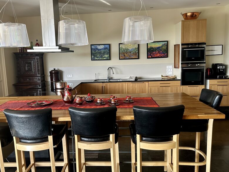 Main Upper: Bar dining and kitchen
