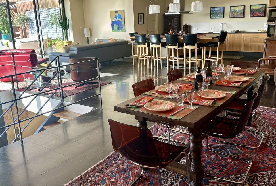 Main Upper: View from dining area to open living and kitchen