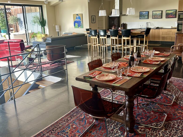 Main Upper: View from dining area to open living and kitchen