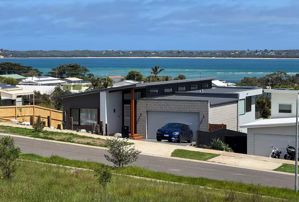 Architectural Elegance with Coastal Views - San Remo, Australia