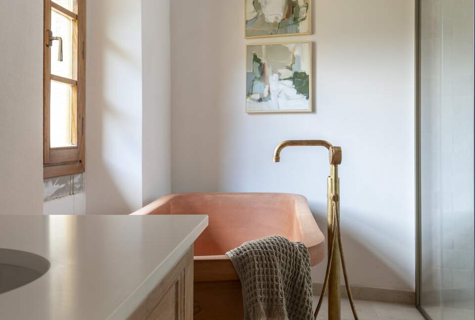 Bathroom with shower and bath