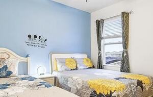 Bedroom with two queens