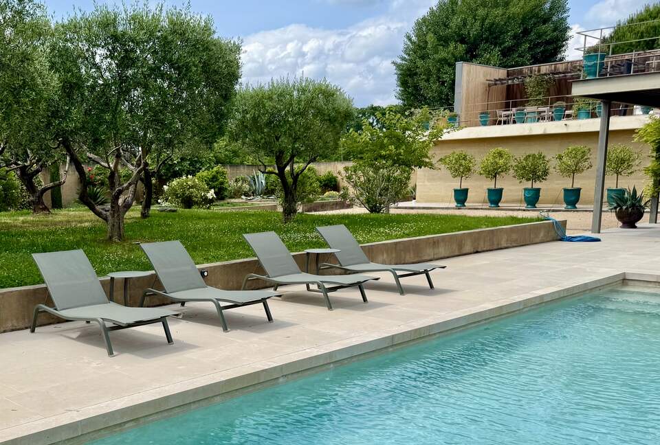Pool: Fermob loungers; view towards Main