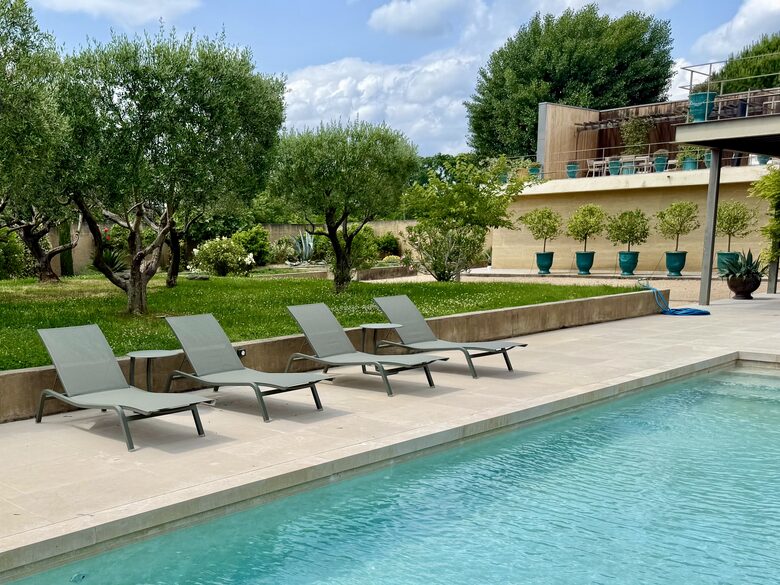 Pool: Fermob loungers; view towards Main