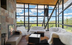 Glass Atrium Room with Wood Burning Fireplace