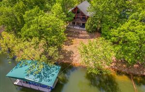 Overhead view of house and dock in the cove