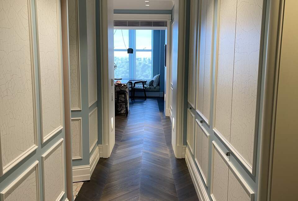 Hallway and entrance to second bedroom and bathroom