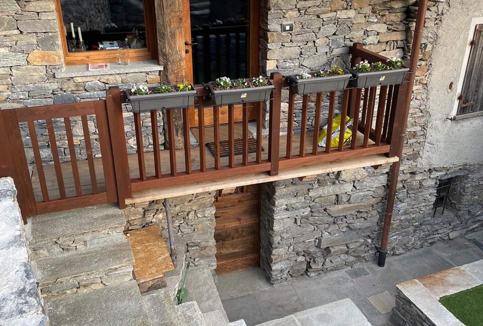 Balcony off of 2nd master suite with wine cellar below