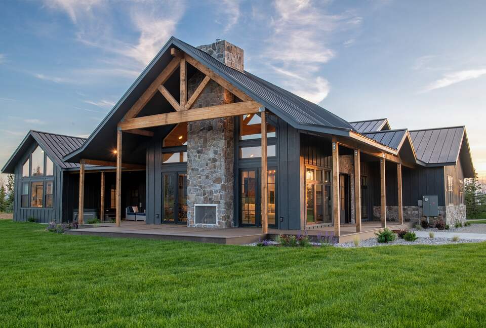 Outdoor living spaces overflow into lush landscaping
