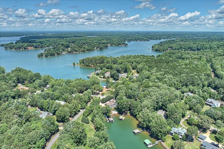 Expansive Lakefront Retreat with Private Beach and Dock - Mooresville, North Carolina