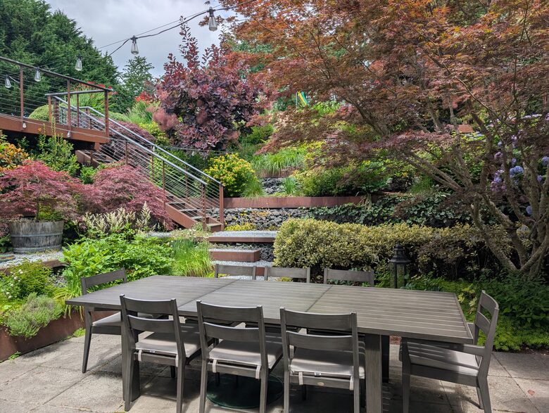 Backyard garden with dining table