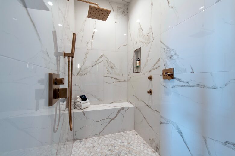 The "Grand" master suite steam shower w/ wall jets