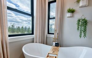 The "Grand" master suite, soaking tub and private view