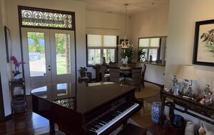 Formal Dining Room with Self Playing Baby Grand