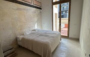 Primary bedroom with en-suite bathroom and access to terrace