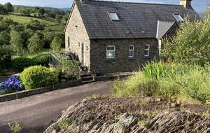 A Stone Cottage Amidst Rolling Hills - Glengarriff, Ireland