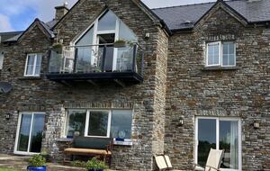 A Stone Cottage Amidst Rolling Hills - Glengarriff, Ireland