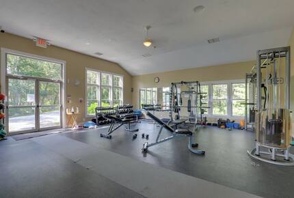 Community gym well equipped w/ cardio & free weight options