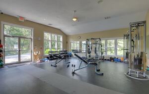 Community gym well equipped w/ cardio & free weight options