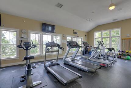 Community gym is just steps away, and overlooks the pond