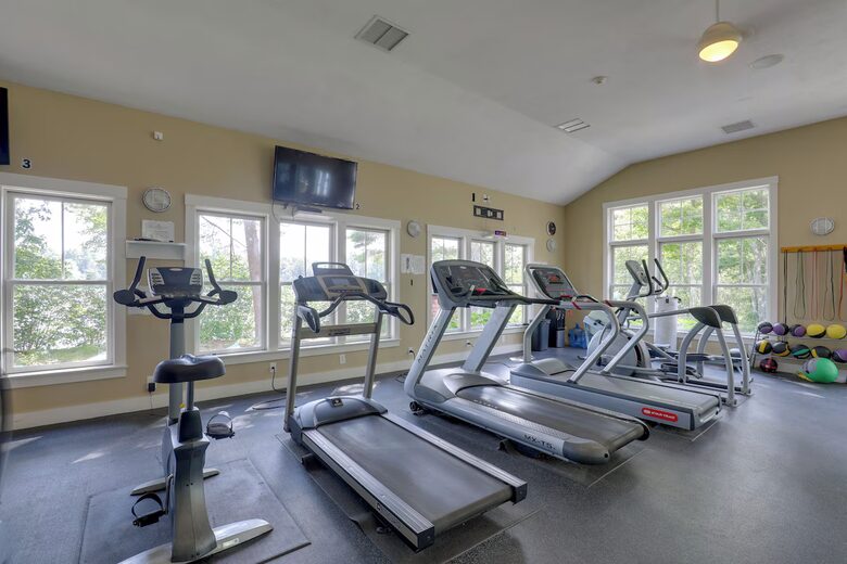 Community gym is just steps away, and overlooks the pond