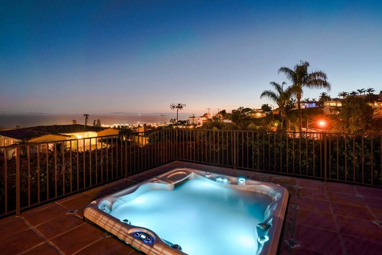 Front patio spa; cover has safety clips in each corner