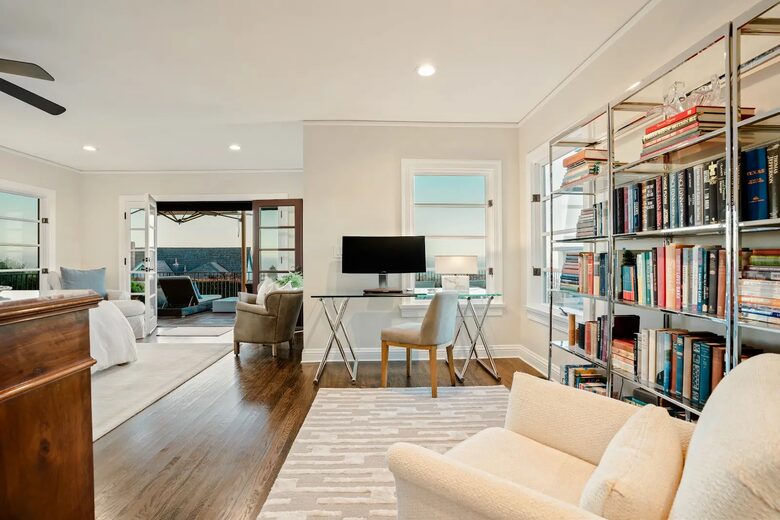 Primary bedroom office area with ocean views