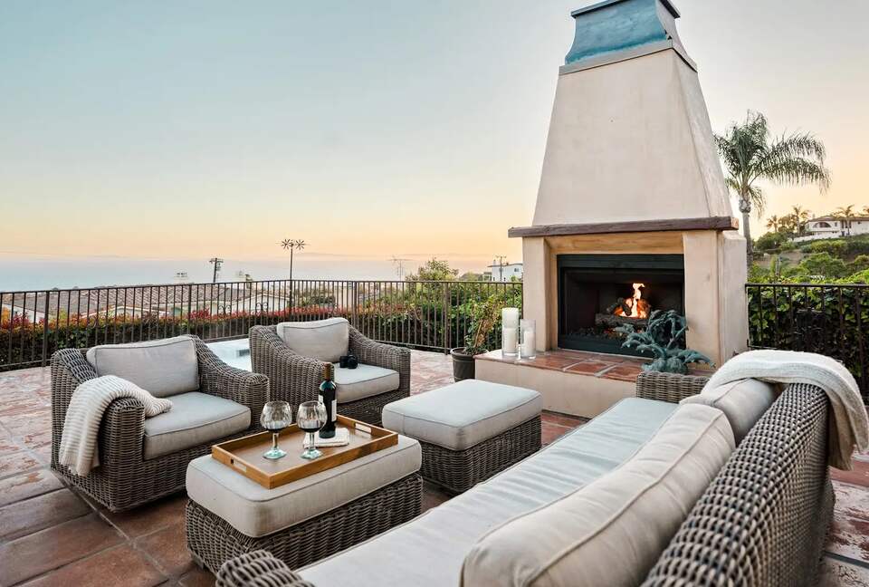 Private front patio with views, spa, and gas fireplace