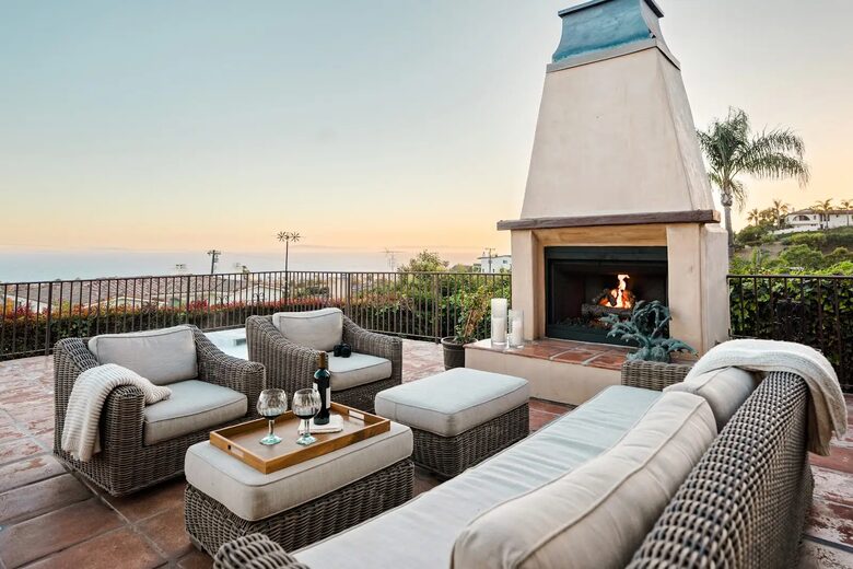 Private front patio with views, spa, and gas fireplace