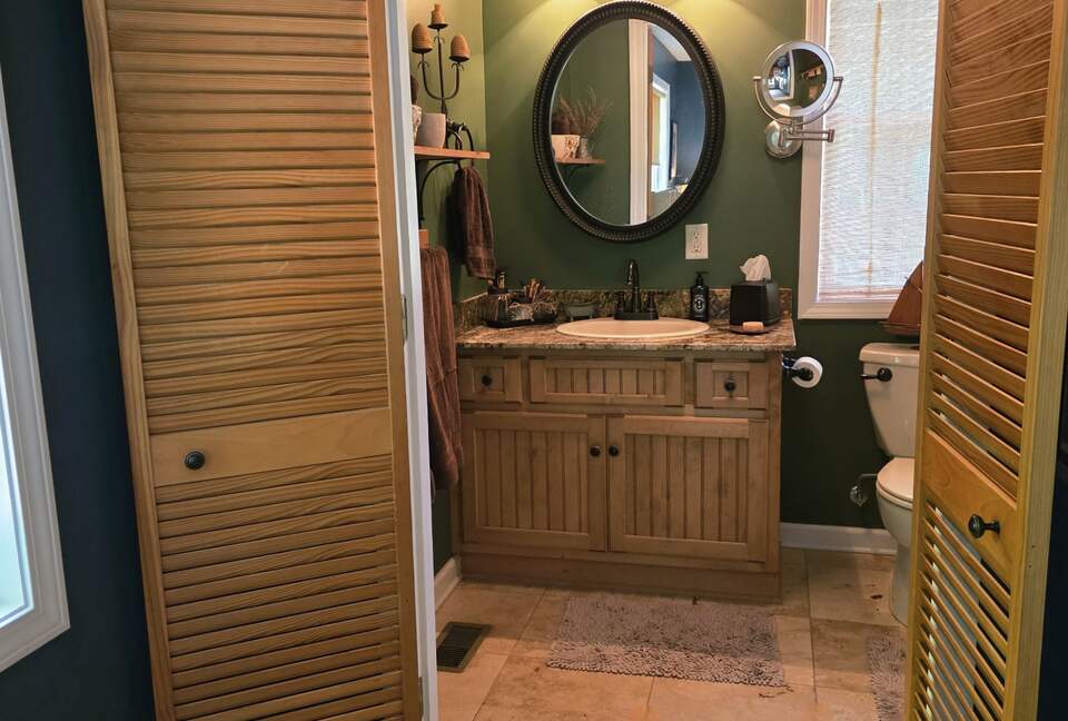 Master bath w/granite counters and oversized shower.