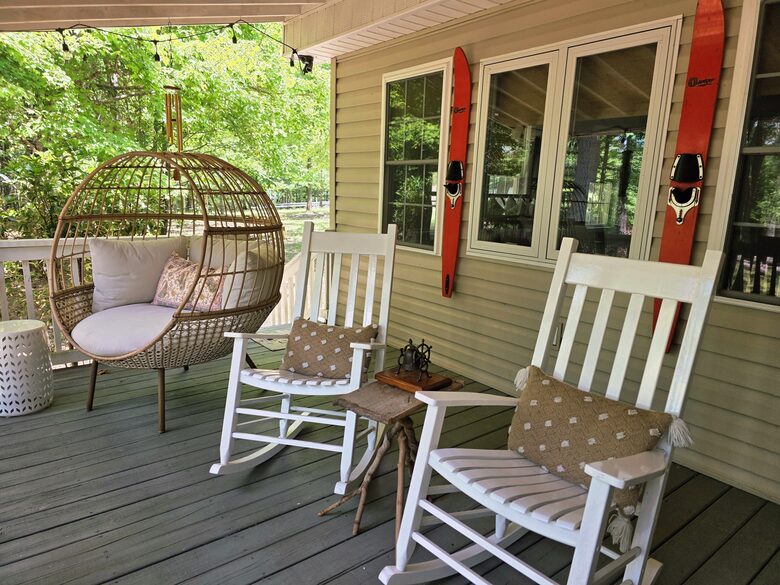 Porch looks to lake.