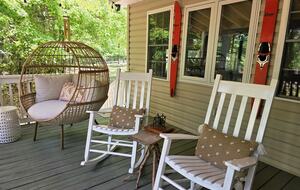 Porch looks to lake.