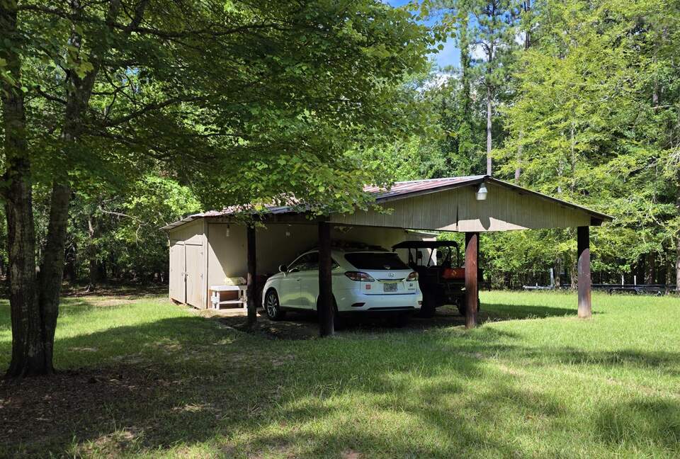 Covered parking for two vehicles.