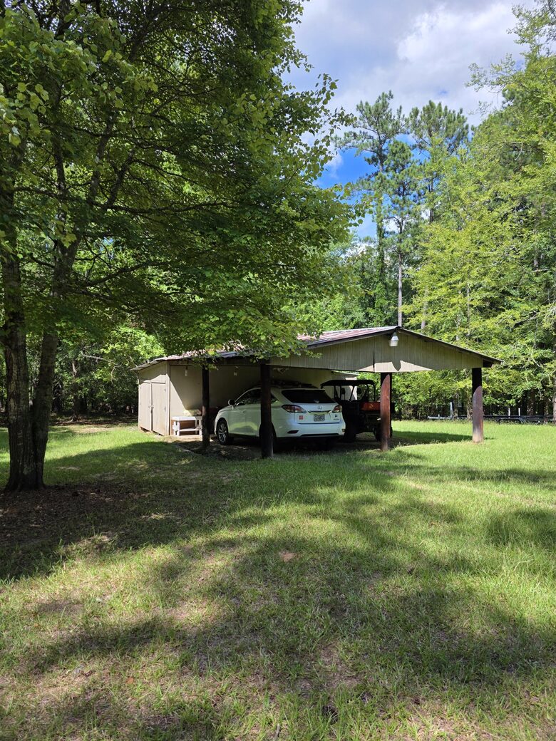 Covered parking for two vehicles.