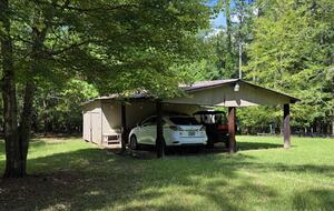 Covered parking for two vehicles.