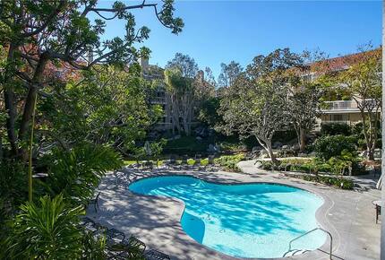 Peaceful Beachside Condo with Pools & Waterfalls - Huntington Beach, California