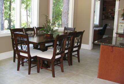 Kitchen table seating for 8, plus 4 bar stools at kitchen island.
