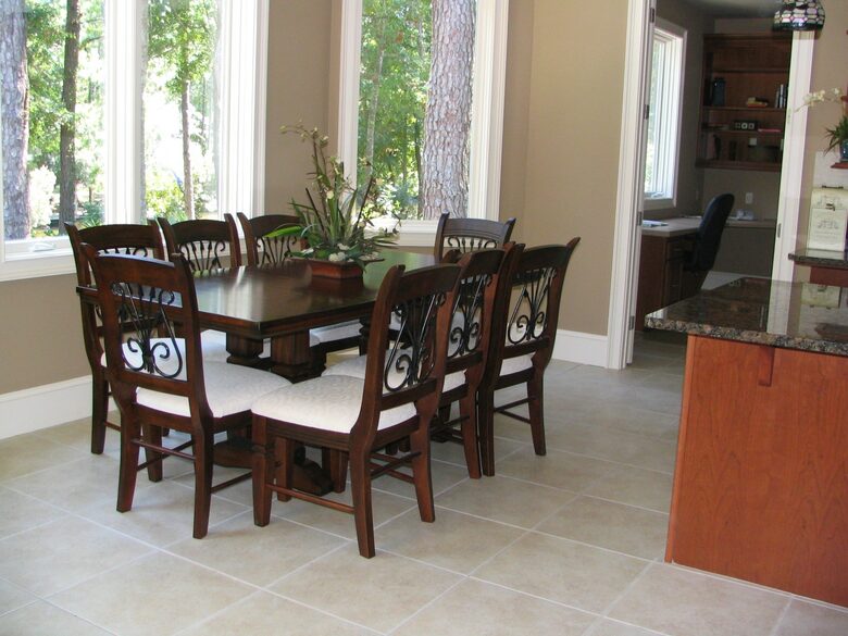 Kitchen table seating for 8, plus 4 bar stools at kitchen island.