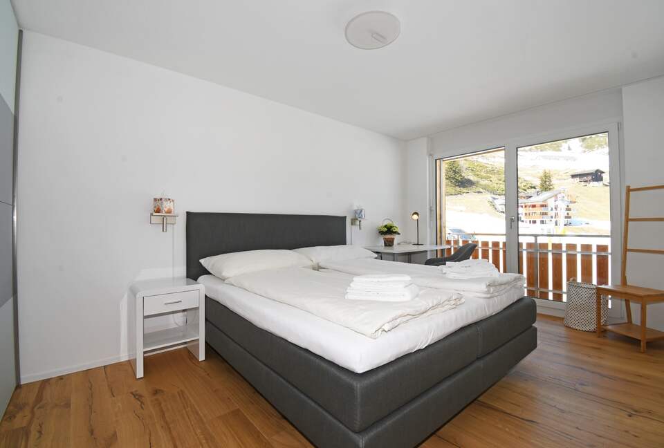 Master bedroom with a double bed